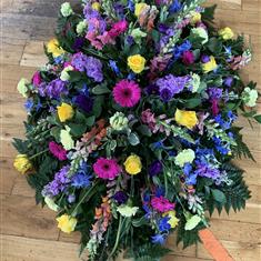 traditional Vibrant casket spray 