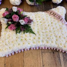 Pink and white pillow 
