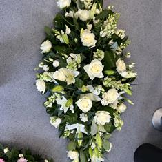 classic green and white casket spray 