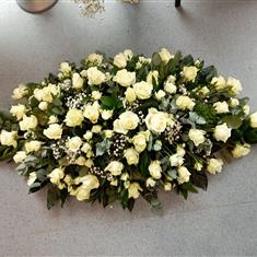 Classical white roses casket spray 