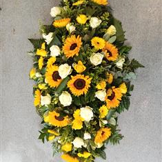 Ray of sunshine casket spray 
