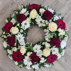 Maroon and white wreath 