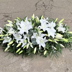 Elegant White lily casket spray 